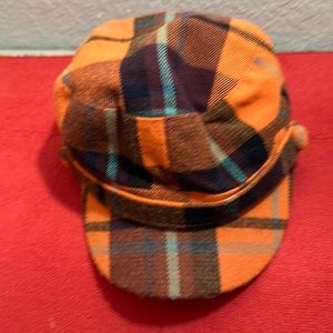 D & Y cap, orange and black striped.